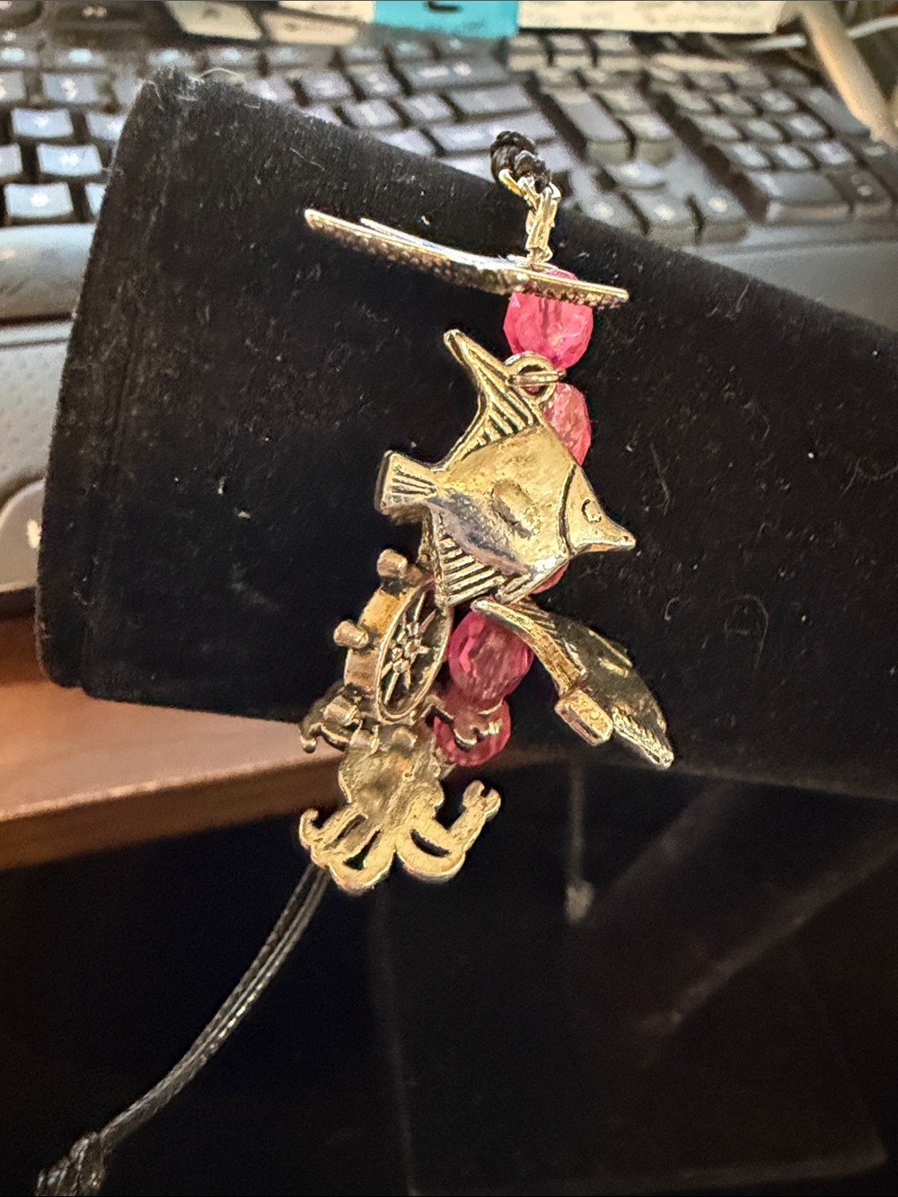 Gold-Tone Fish Charm Bracelet with Pink Beads